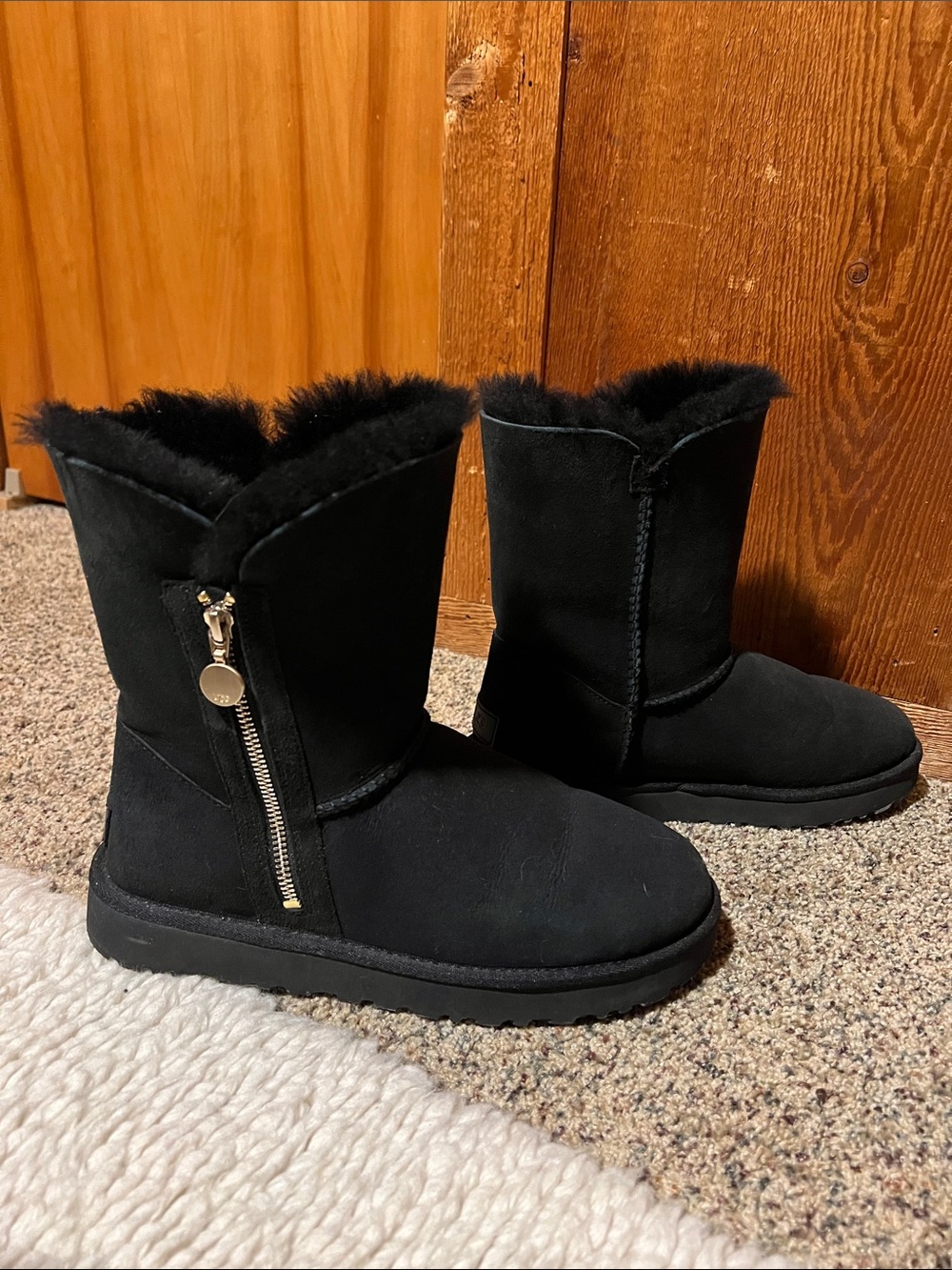 UGG Bailey Zip Short Black Suede Shearling Boots with Gold Side Zip